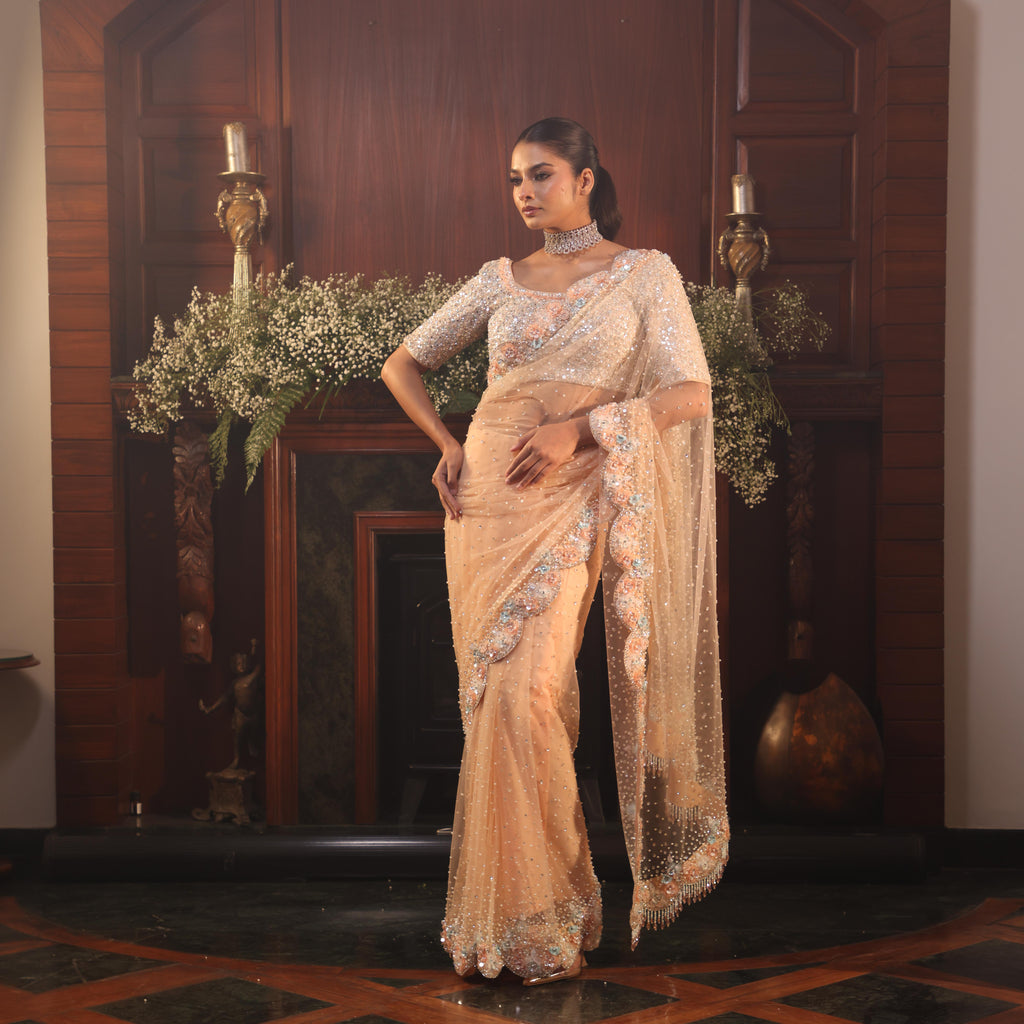 peach net flowers saree