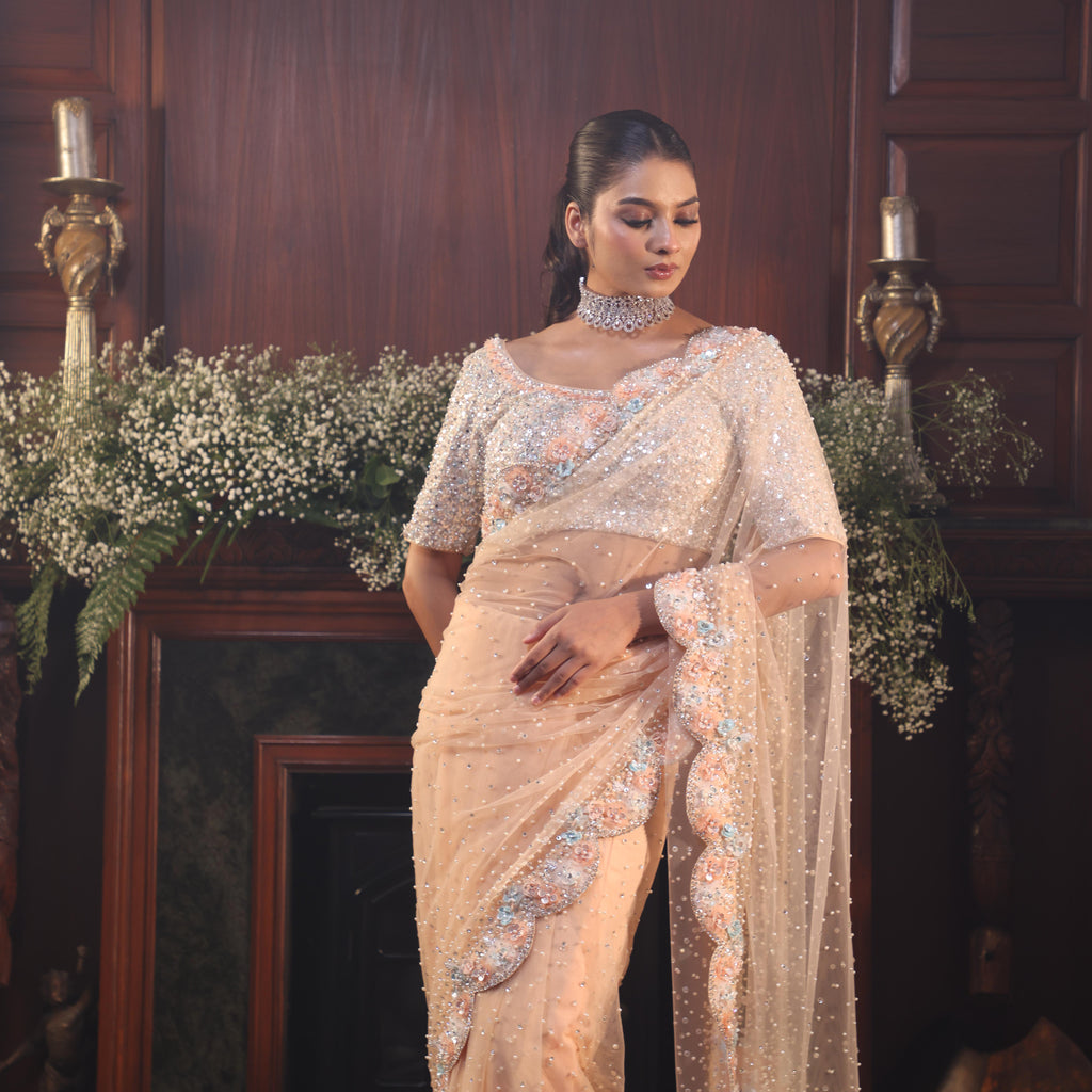peach net flowers saree