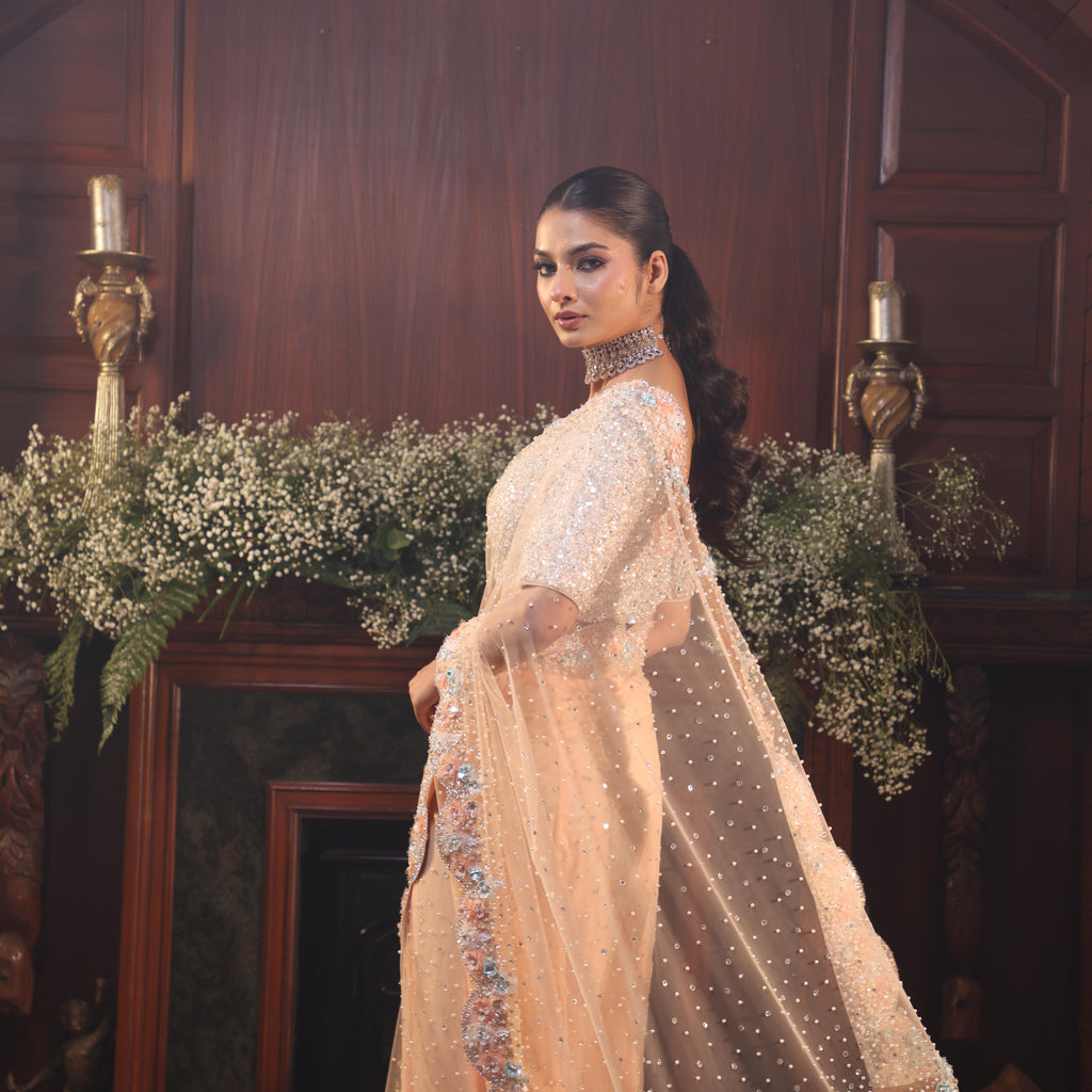 peach net flowers saree