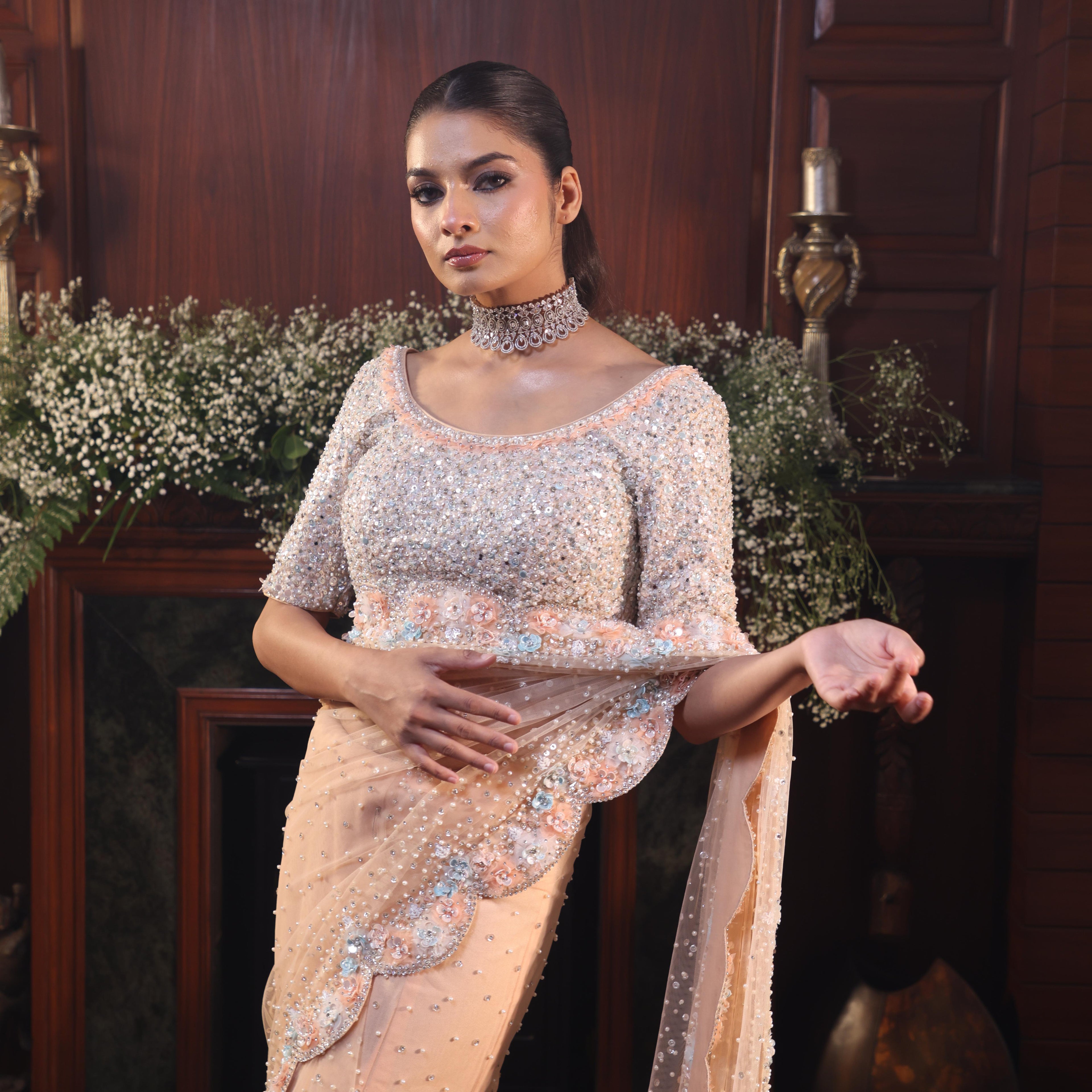 peach net flowers saree