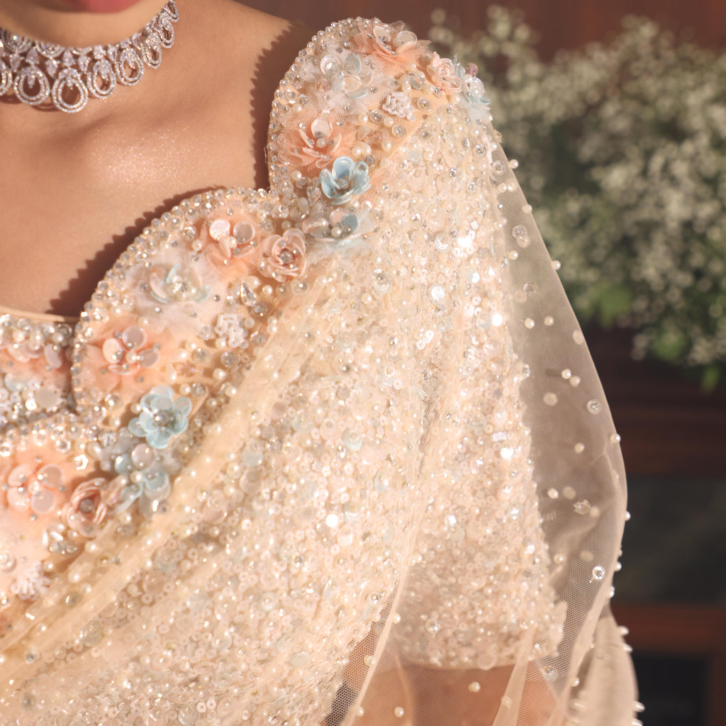 peach net flowers saree
